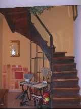 Staircase in wood & terracotta tiles